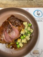 Petto d’anatra CBT, insalata di panissa,cipollotto e piselli